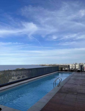 Olivos Piscina con vistas a la ciudad en un piso 17